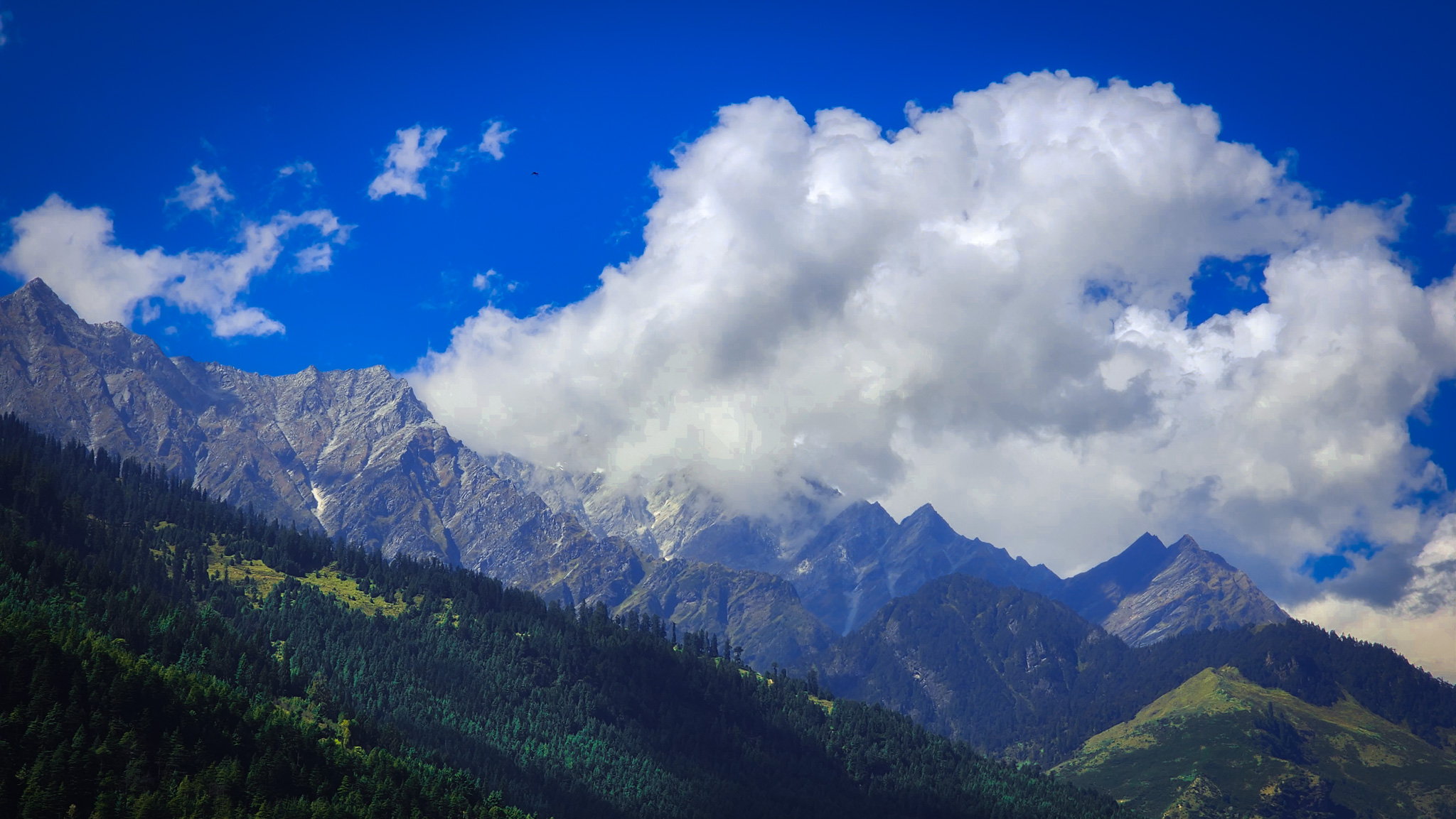 Himalayan clouds gathering over mountain ridgelines in Ladakh