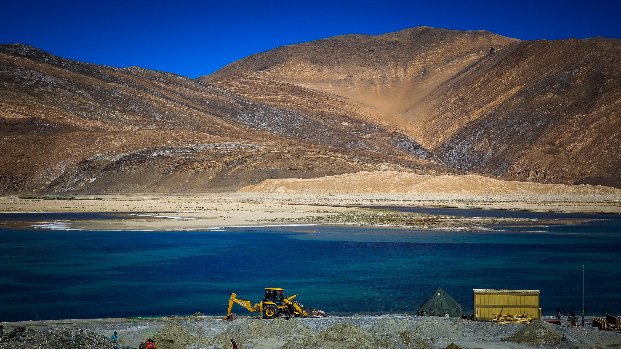 Roadside life and landscape beside the still waters of Pangong Lake